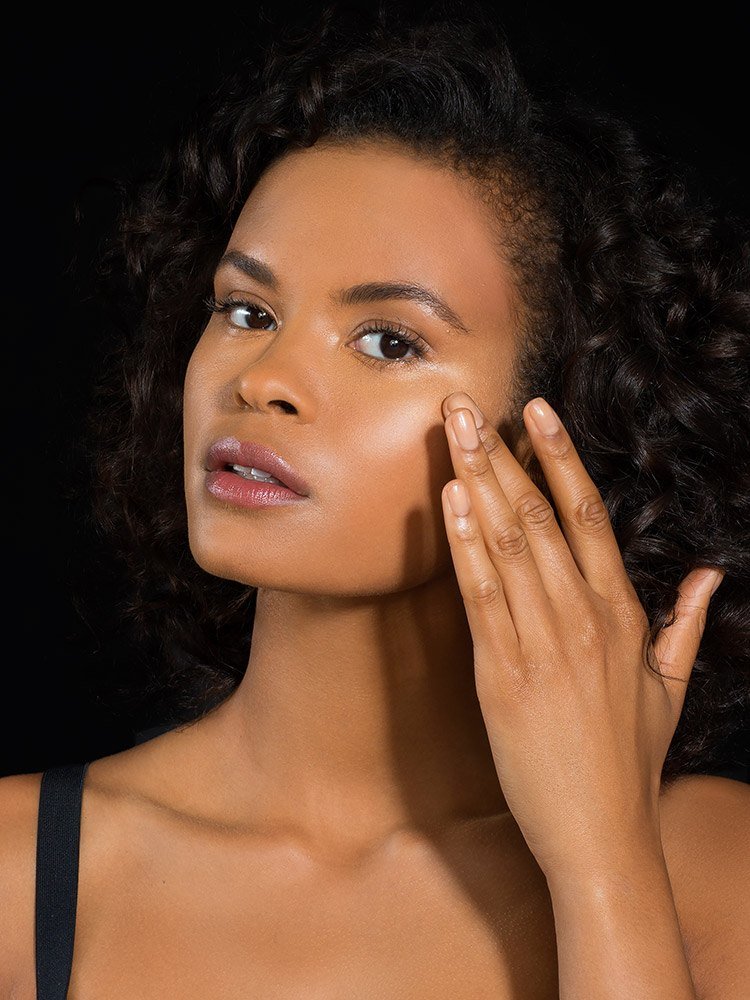 How to color correct deep model applying product on cheek
