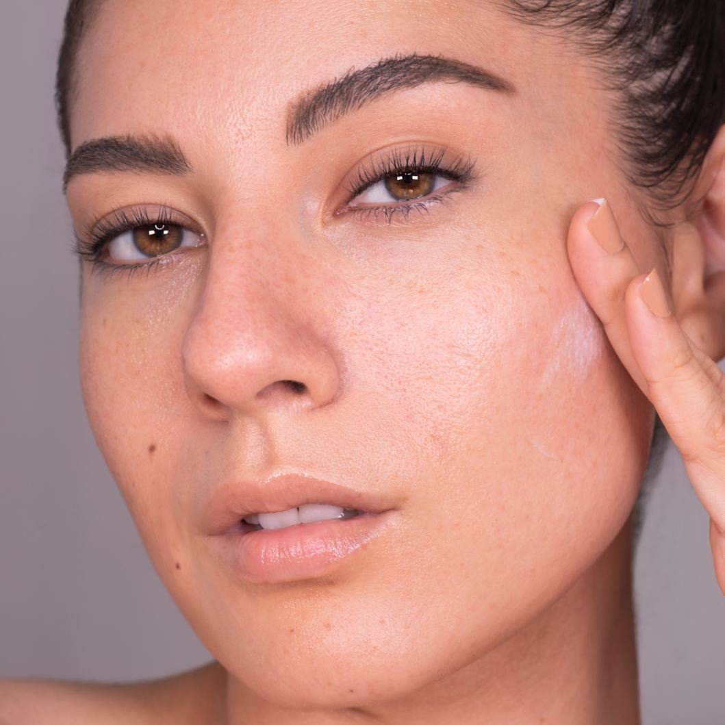 Fit Me mattifying primer being applied by woman 